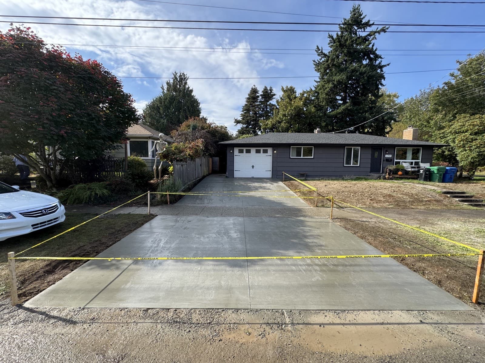 Grey house driveway replacement